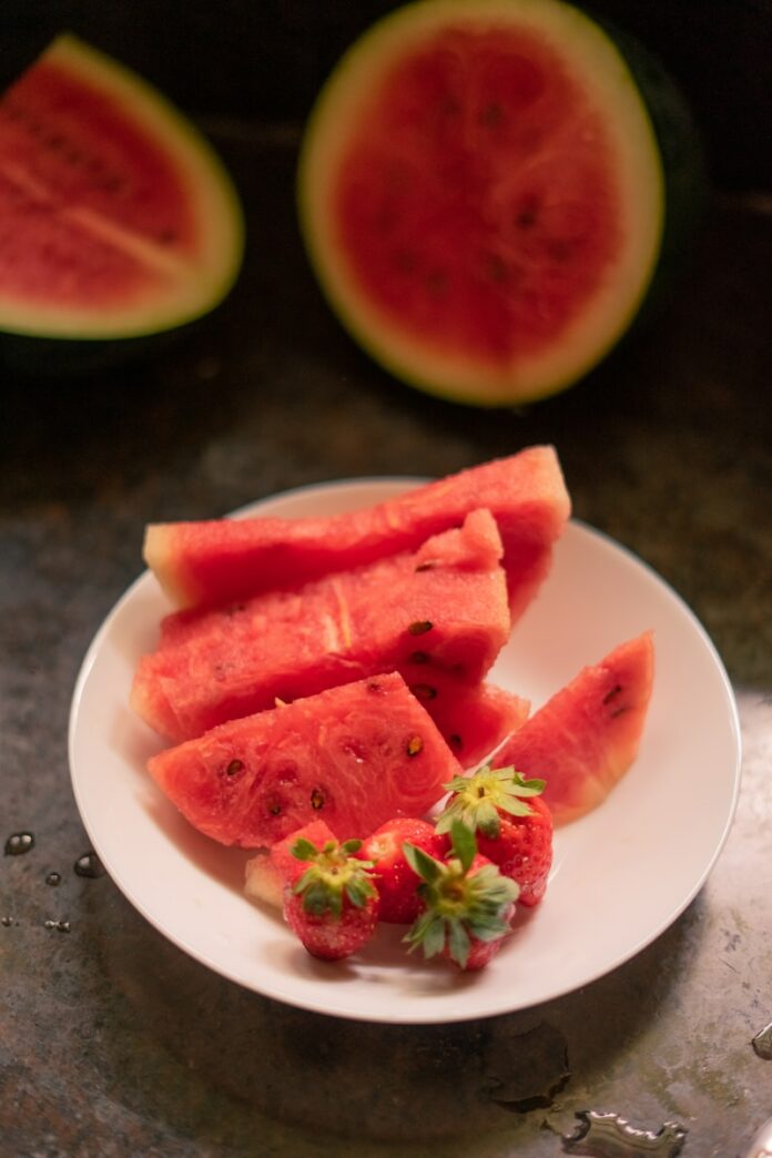 Photo by Shreyak Singh sliced watermelon on white ceramic plate