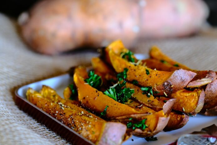 Photo by Rajesh Kavasseri sliced vegetable on brown wooden chopping board