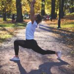 바쁜 일상 속 웰니스 문화, 나만의 작은 습관에서 시작된다 woman stretching on pathway